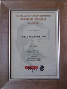 A photograph of the certificate awarded to Concerts for Craswall Founder Sue Norrington winner of the Elgar in Hereford Award